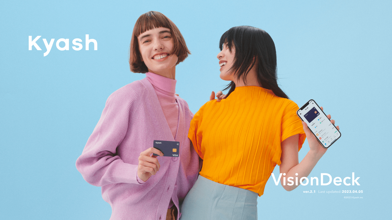 Kyash VisionDeck Ver.2.1の表紙画像。2人の女性がKyashのカードとスマホを持って笑い合っている様子。